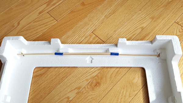 Make a curtain rod for the puppet theater