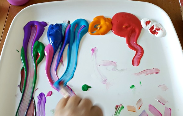 Mix paint colors with a paint brush preschool art activity