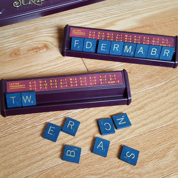 Literacy games with early learners using letters of the alphabet tiles